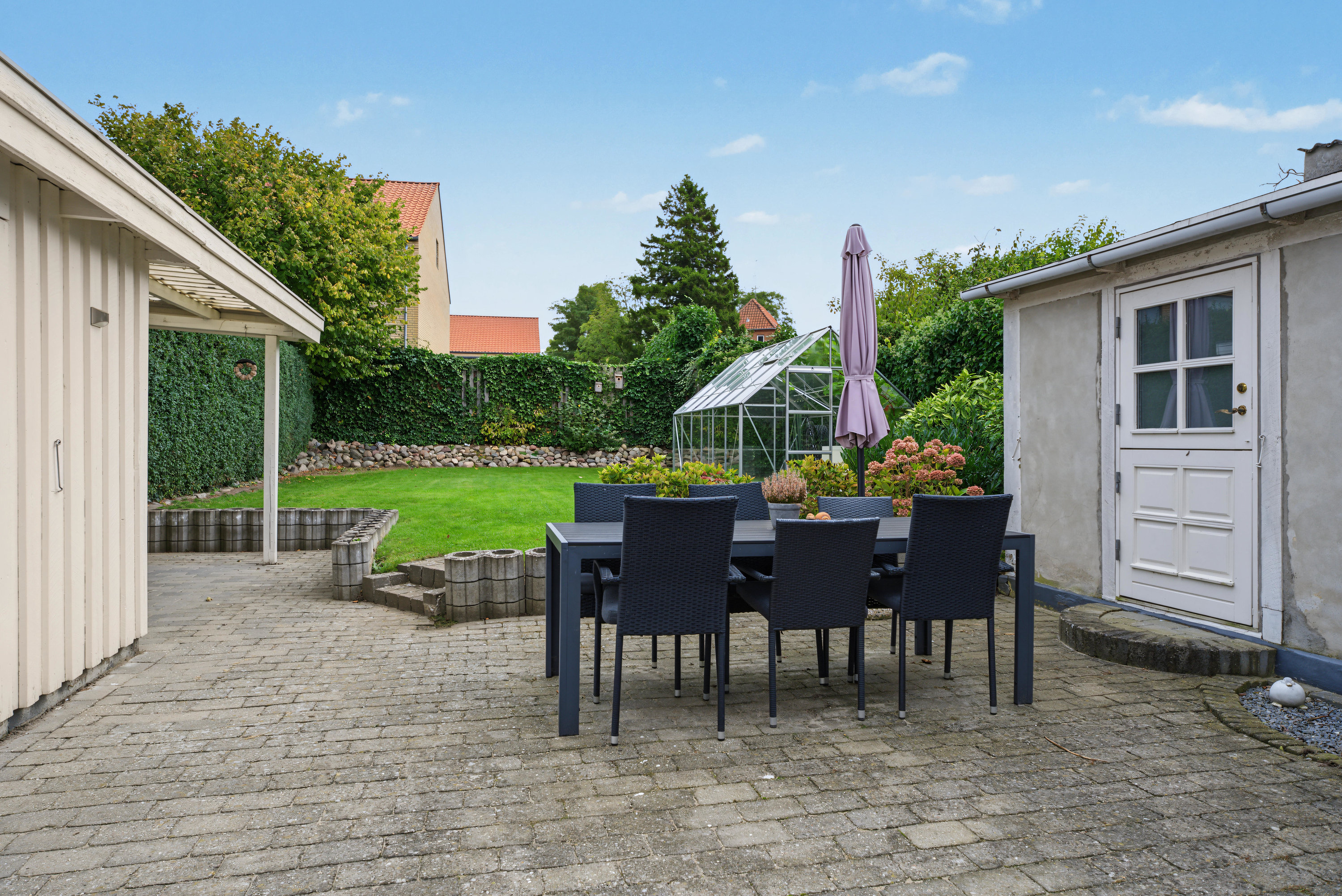 Fremhævet terrasse billede i fuldskærmstilstand. Billede af Thorsensvej 3, 4800 Nykøbing F