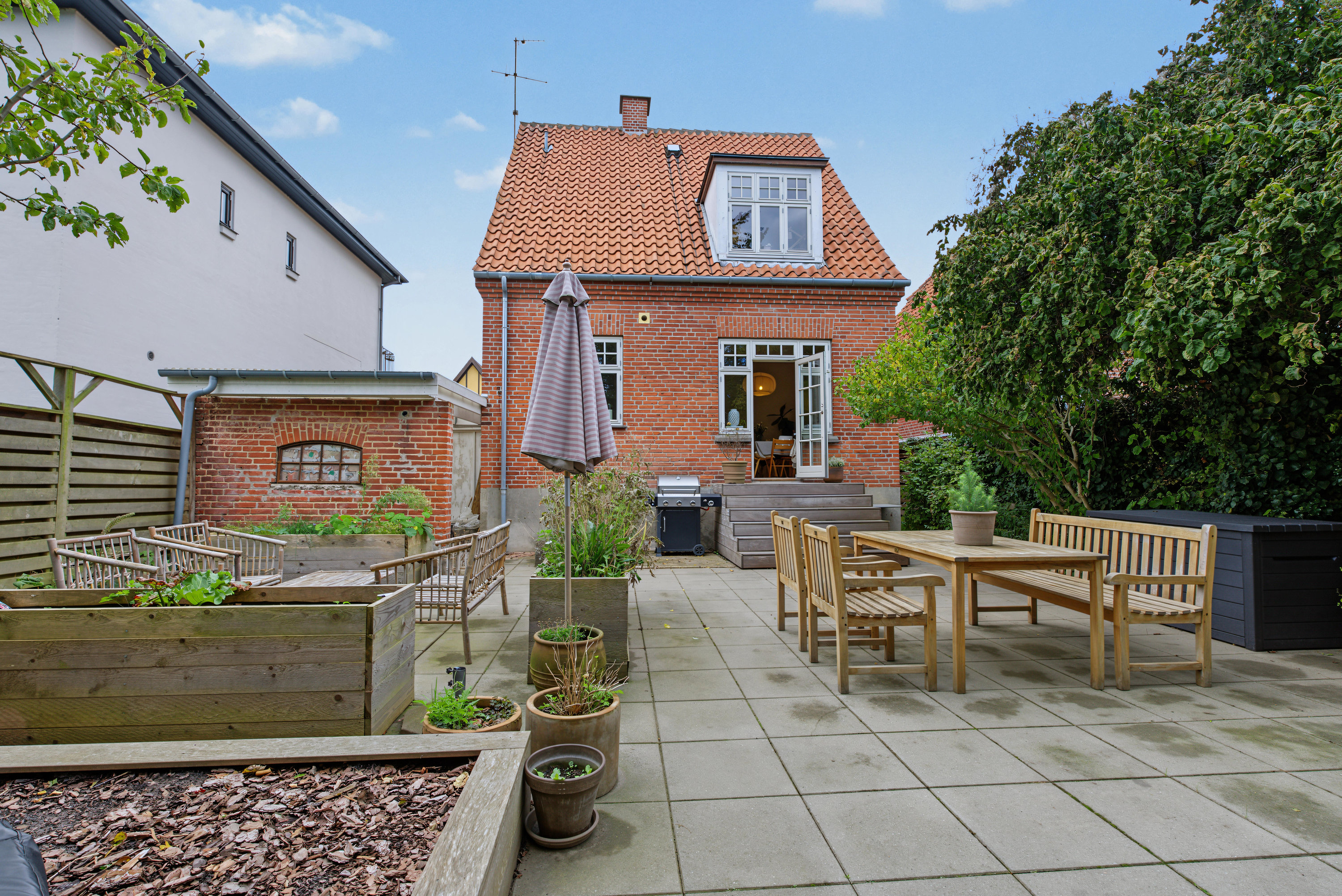 Fremhævet terrasse billede i fuldskærmstilstand. Billede af Pomonagade 24, 4800 Nykøbing F