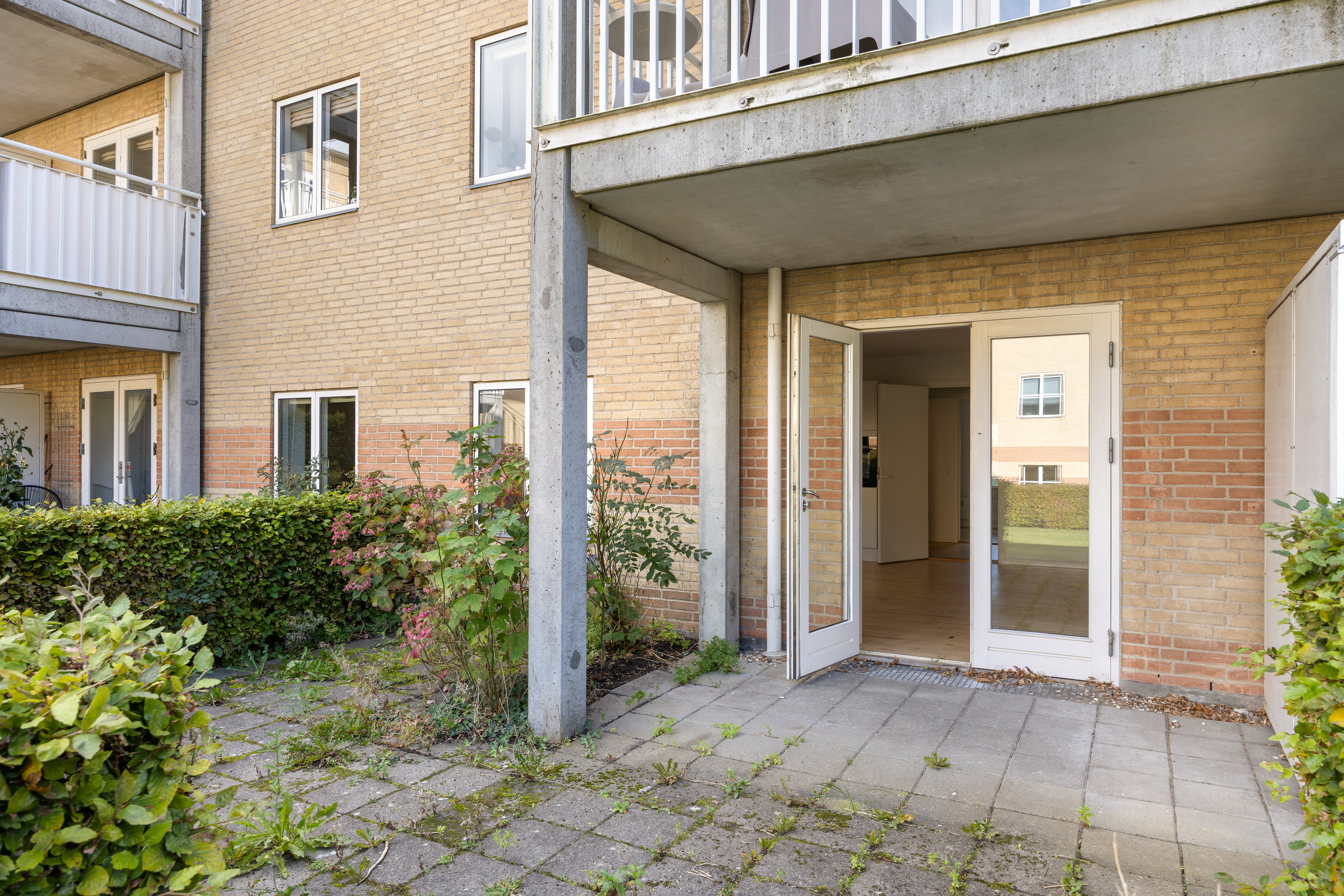 Fremhævet gårdmiljø billede i fuldskærmstilstand. Billede af Nørgaardsvej 16B, st. th., 2800 Kongens Lyngby