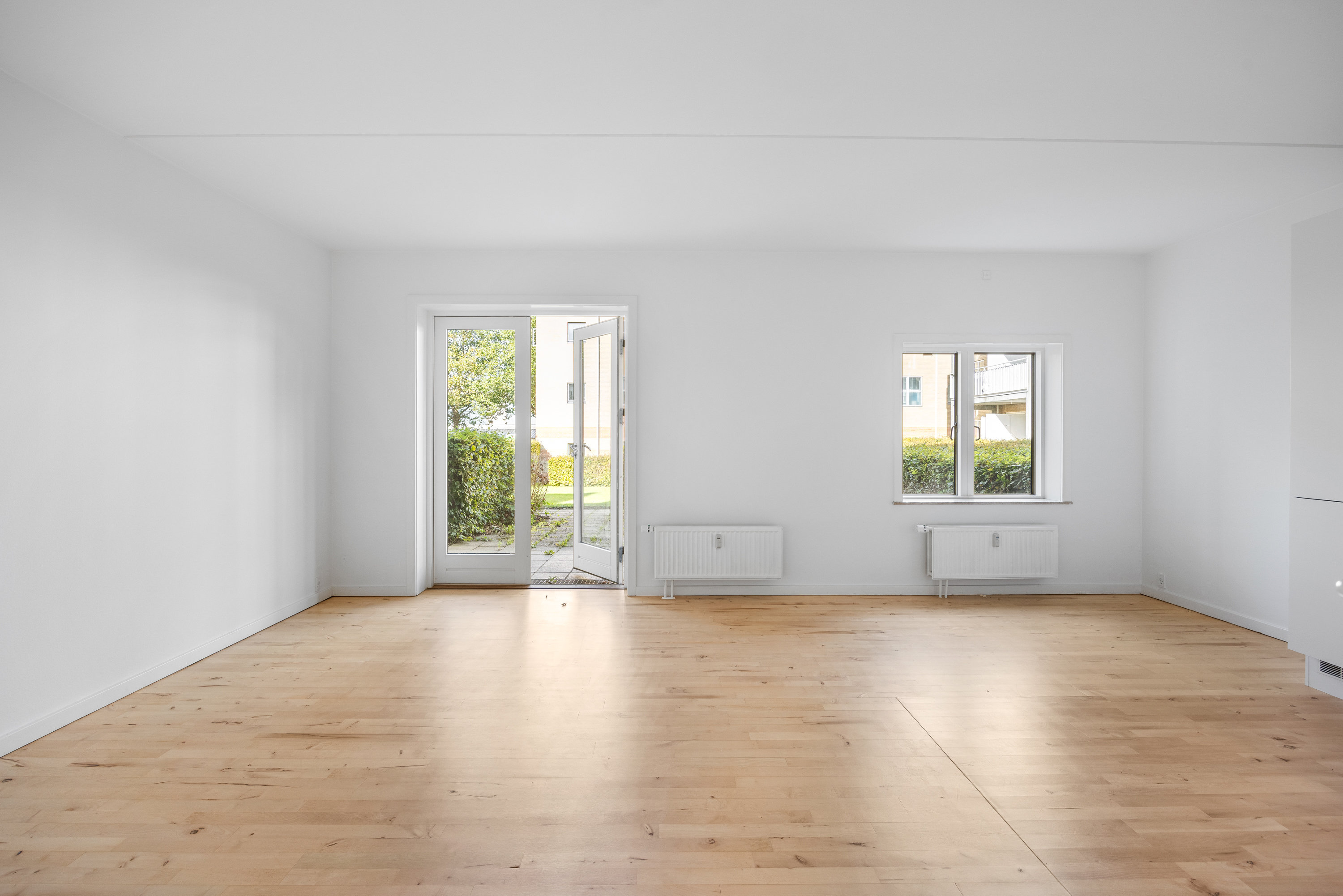 Fremhævet stue billede i fuldskærmstilstand. Billede af Nørgaardsvej 16B, st. th., 2800 Kongens Lyngby