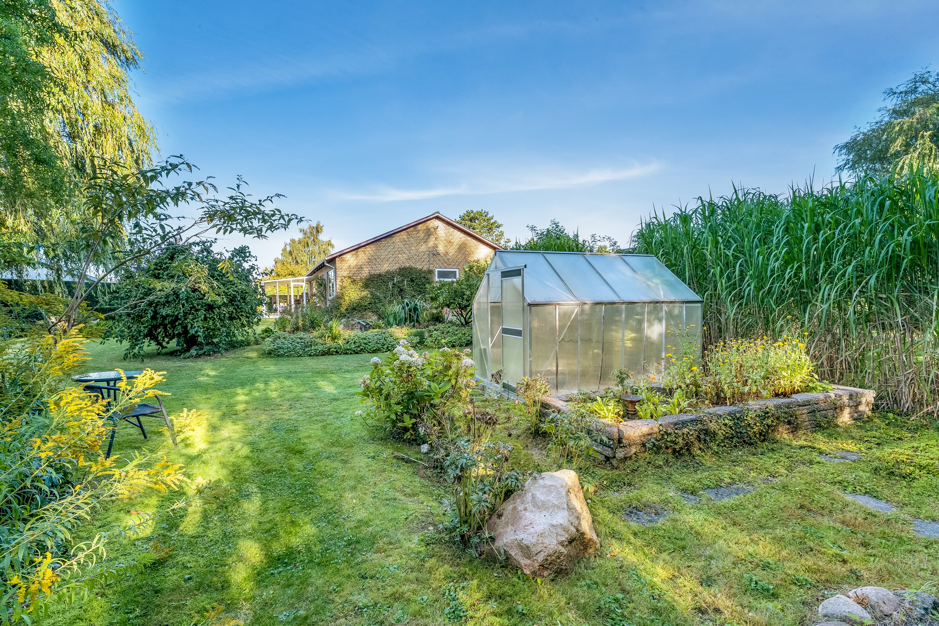 Fremhævet have billede i fuldskærmstilstand. Billede af Møllevænget 13, 4913 Horslunde