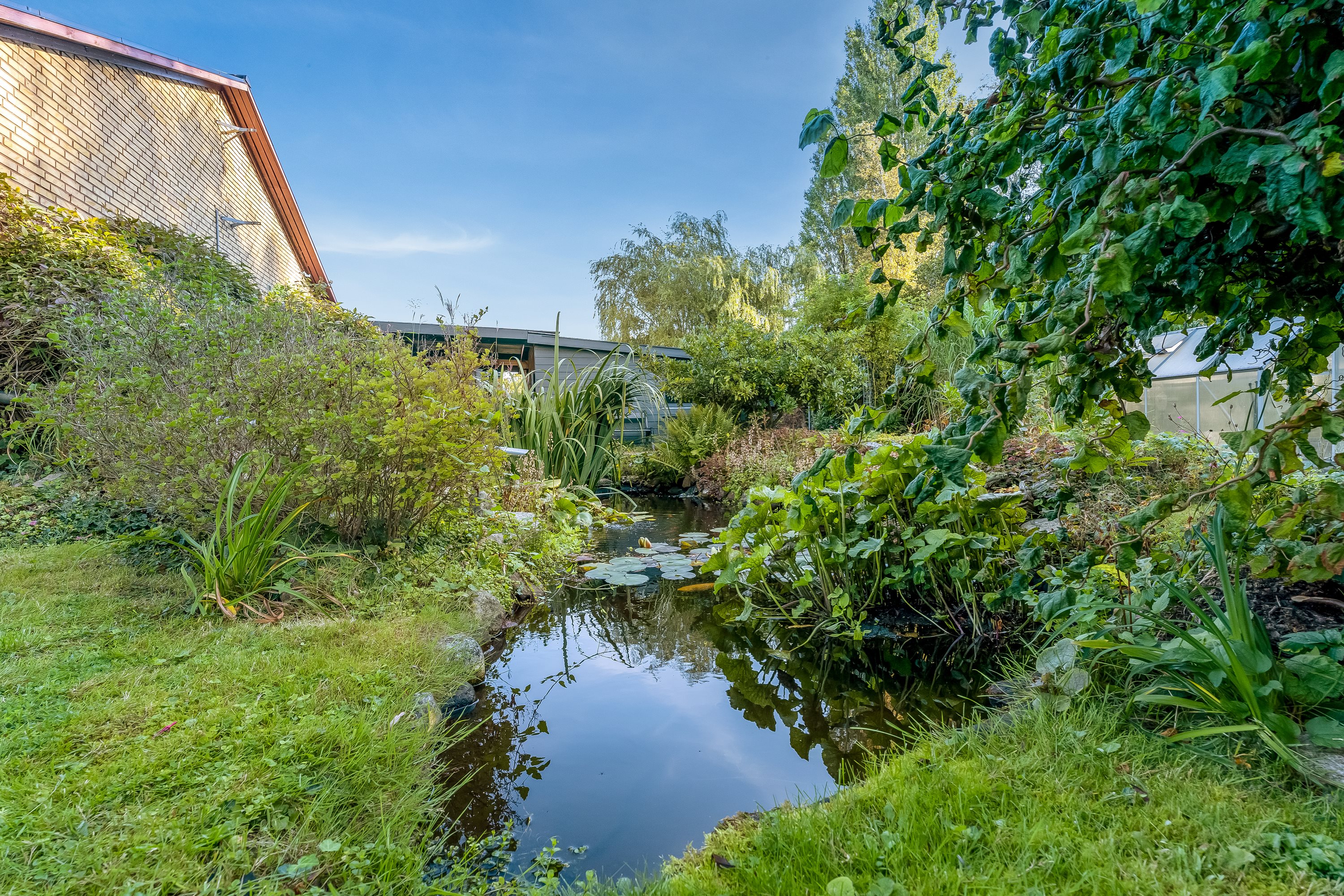 Fremhævet have billede i fuldskærmstilstand. Billede af Møllevænget 13, 4913 Horslunde